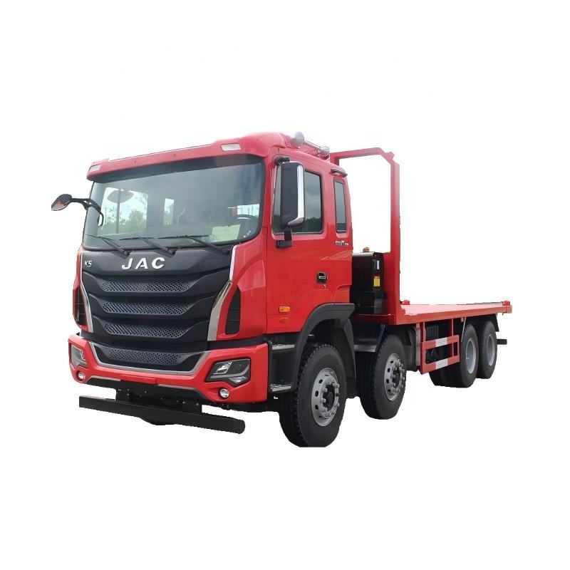 &Ccedil;ok Fonksiyonlu Bir 8x4 D&uuml;z Yataklı Dump Kamyonu Ve 20 Metrelik Bir Konteyner Taşıma Ara